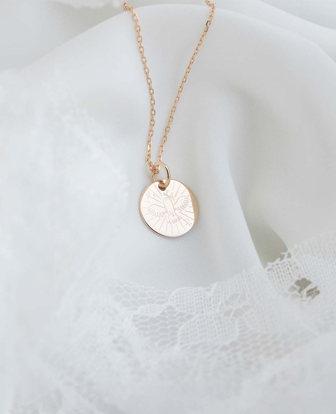 Taufmedaille mit Taube und Olivenzweig