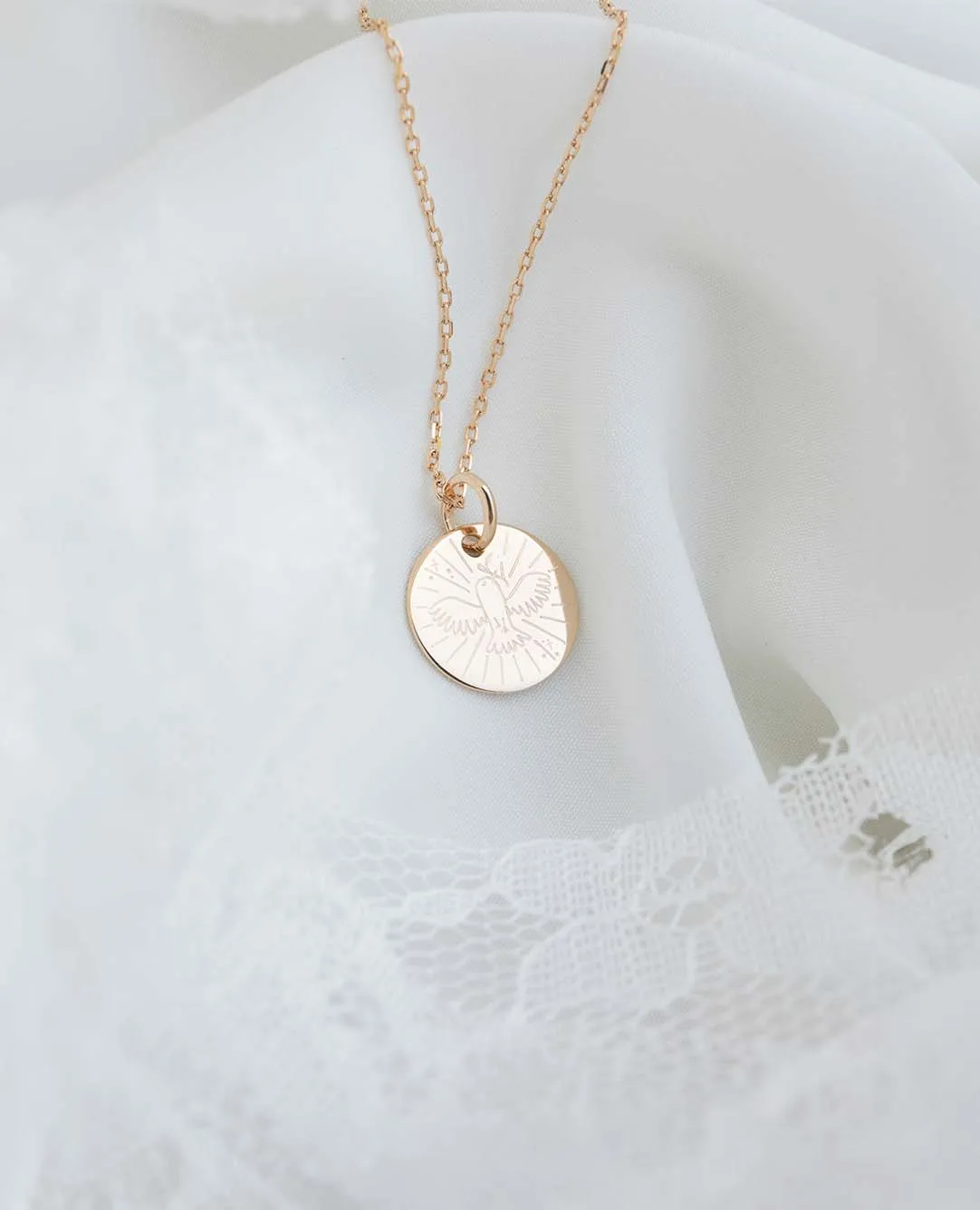 Taufmedaille mit Taube und Olivenzweig