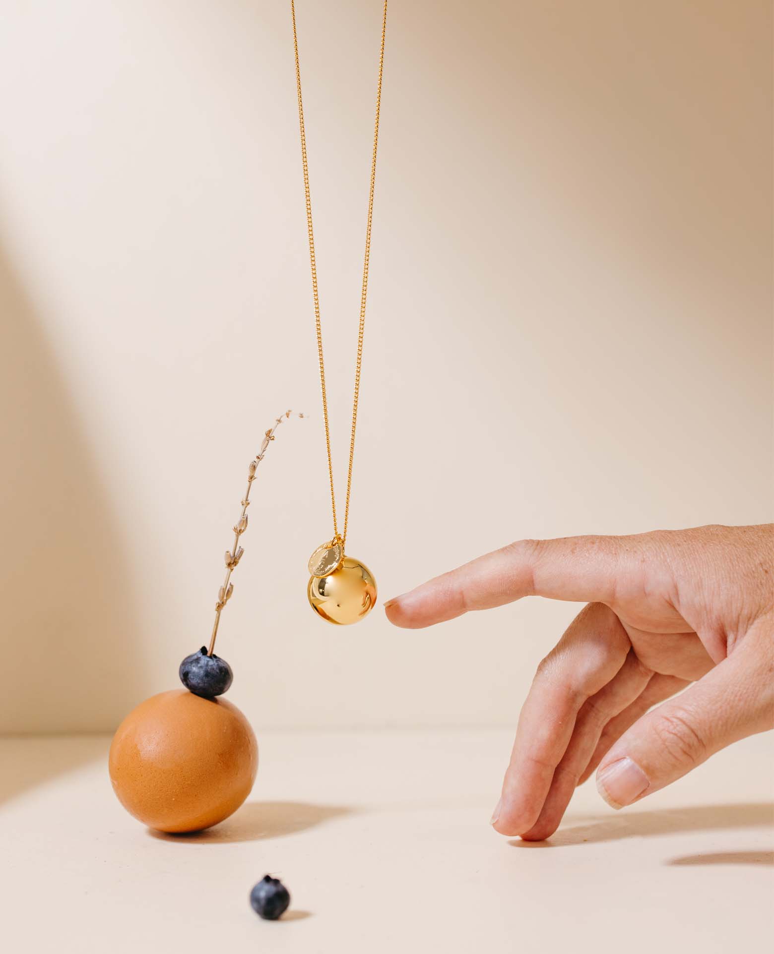 Personalisierte Schwangerschafts-Klangkugel Gold <i>Céleste</i>